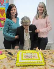 Birthday girl Bridget Hughes with her daughters Mary Doheny, left, and Christina McCarthy, right.