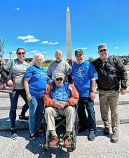 Hudson Valley Honor Flight participants include Ken Space in wheelchair and, left to right behind him, Erin Morrissey, Maureen Space, Ed Mullins, Stan Martin and Bob Carl.