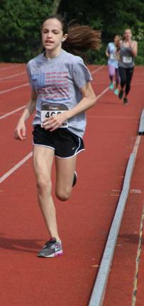 Warwick Valley Middle School Mileage Club: 165 students, 3,016 laps, 754 miles Sixth grader Claire Priebke.