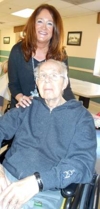Local resident brings 120 gifts to residents of Schervier Pavilion Provided photo Niki Folina with Schervier Pavilion resident Anthony Felicito.