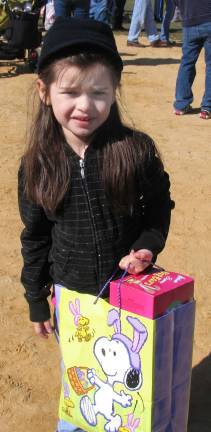 In search of the golden eggs Photo by Roger Gavan Brooke Squillante, 4, found a "golden egg" and collected a bag of prizes.