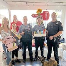 Warwick police and Keller Williams join forces for Backpack Snack Attacks