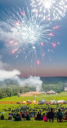 Around 9:35 p.m. the first fireworks lit up the sky and illuminating the crowd below.