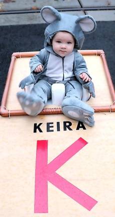 Captured in a mouse trap, Keira Kelly, 7 mos., won most creative in the under five year old age group.