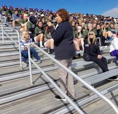 Provided photo Cindy Parson of the Wounded Warrior Project, whose son was severely injured in Iraq, addresses the students from Warwick and North Rockland prior to the start of the annual Wounded Warrior Challenge held last Saturday on the Warwick Valley High School campus.
