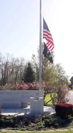 This is what the entrance to Veterans Memorial Park looked like before Warwick Boy Scout Troop 45 got to work last Sunday.