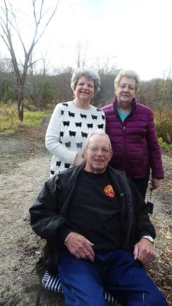 Rotten, broken, dangerous Goosepond bridge is repaired Brenda Board Burgan stands next to her mother, Nancy, and behind her father, Clarence Board. The land and the Seely Brook bridge played an important part in the life of their family (Photo by Frances Ruth Harris)