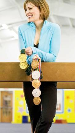 Olympic gymnast coming to Sports, Fitness and Fun for open gym event Shannon Miller today.