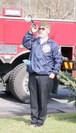 The ceremonies quietly ended as Commander Mac Donald played Taps.