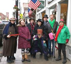 To get everyone in the holiday spirit, some brave members of the Warwick Valley Chorale strolled along Main Street and Railroad Avenue, stopping at many of the shops and restaurants, singing traditional Christmas carols.
