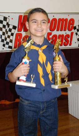 GWL Pinewood Derby GWL Pack 121, Den 7, Wolf Dean DiMattina is the Grand Champion Pinewood Derby 2018. The seven-year-old is the son of Tiffany and Joe DiMattina.