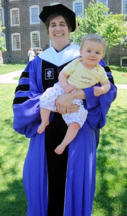 Karen Krahulik, Ph.D., with her daughter Sonya at a Brown University graduation. Dr. Krahulik is wearing her NYU robe.