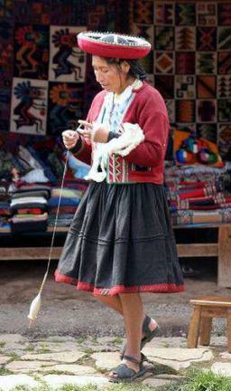 Hand spinning group forming Courtesy photo Many cultures today continue the tradition of hand spinning.