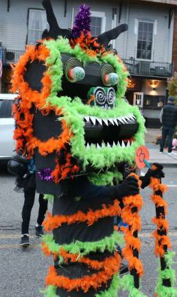 Annual Lions Club and Village of Warwick Halloween Parade draws 1,200 witches, goblins and other assorted characters Ozzie Tobin,12, won most original in his age group.