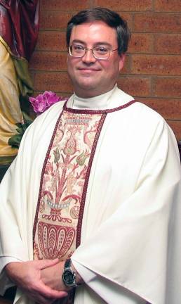 St. Stephen's pastor to be honored at Catholic Charities dinner Rev. Michael McLoughlin, pastor of the Church of St. Stephen, the First Martyr, will be honored with a presentation of the 2014 Caritas Awards at the eighth annual Celebration of Charity on Thursday, April 3 at 6 p.m.