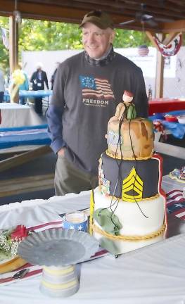 The Ladies Auxiliary Unit 1443 and the Catholic Daughters, Court Holy Rosary, presented Tom O’Hare with this three tiered cake that included the stripes awarded a master sergeant.