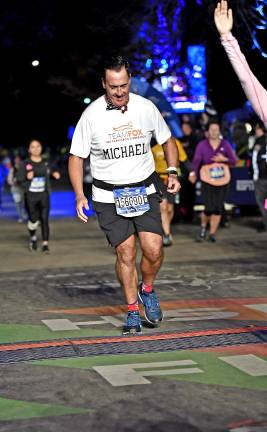 I run in memory of my parents Provided photo Michael Robert Fish ran his first marathon at the 2018 TCS New York City Marathon as part in the fight against Parkinson's Disease as a Team Fox member.