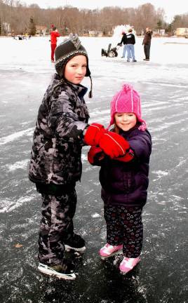 On frozen Greenwood Lake Keiran Gilson, 8 and sister Maya 4, try out their new ice skates last weekend on Greenwood Lake.