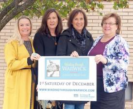 Holding the 2019 Winding Through Warwick holiday house tour banner, from left , are committee members: Barbara Sullivan, co-chair; Caroline Hamling, co-chair; Terry Quint and Katie Bisaro. Committee members not pictured include: Ilene Cahn, Mary Juliano, Toni Kreusch, Tracey Kunar, Barbara Pierson, Anita Volpe and Sally Woglom.