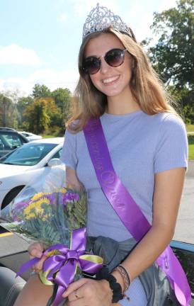 Crowds enjoy Homecoming Day Parade on Main Street Homecoming Day Queen Bella Jardine.