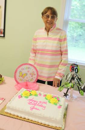 Photo by Roger Gavan Joan Nagrod is about to cut the cake for her 90th birthday celebration at The Warwick Valley Seniors Club