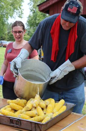 Senior barbecue draws 500 to Union Corners Town Park Corn always tastes best with melted butter.