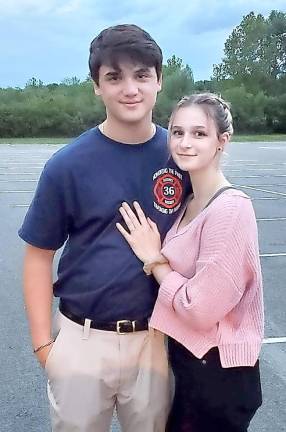 Warwick Fire Department weekly activity report Sept. 1-7 Warwick firefighter Michael Velez-Cosgrove, pictured here with his girlfriend, graduated Tuesday evening from the Orange County Fire Training Center’s Interior Fire Operations Course. Photos provided by the Warwick Fire Department.