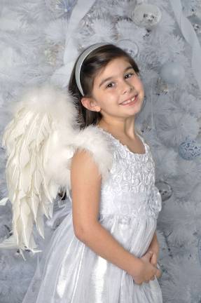 Vote for the best holiday photo Photo submitted by: Peg Schumann of Stockholm, N.J. "Every year my daughter takes my granddaughter for her Christmas photo session. She's an angel!"