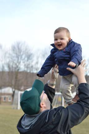 One Lucky Leprechaun Brian. From serious to so very happy, he is our little lucky charm! Photo courtesy of Brianne.