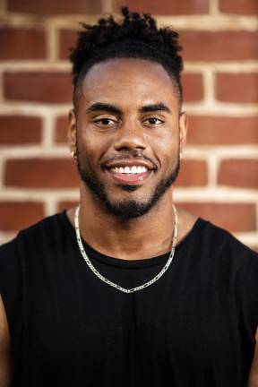 [Former NFL running back, Rashad Jennings, is photographed during a lifestyle football shoot in his]