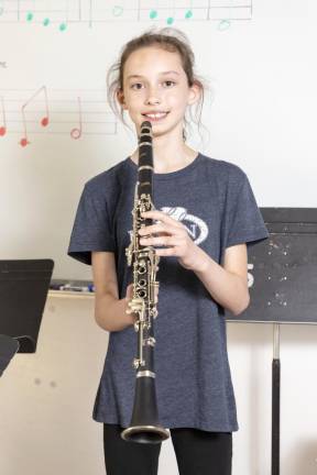 Park Avenue Elementary School fouth grader Piper Stewen with her clarinanet on May 9, 2022.