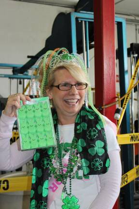 Celebrating St. Patrick's Day Lisaann Permunian of Wantage, N.J. "10 year breast cancer survivor Lisaann Permunian had a Celebration of Life at the Sussex Fire Department's St. Baldricks Event on March 15. Here she is all in green getting ready to have her head shaved."