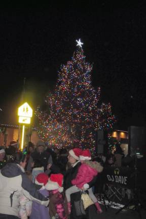 The Christmas tree was lit after the singing, musical, and dance performances.