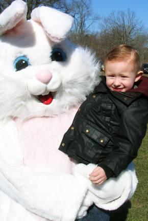 In search of the golden eggs The Easter Bunny was also on hand to greet the children and, like Maddox Eschmann, 3, pose for photos.