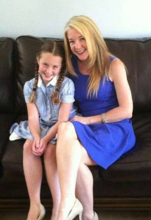 Mother Daughter Look A Like contest Photo submitted by Tiffany O'Keefe of Warwick "This is a picture of my daughter Keira and I in our favorite color."