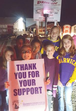 Fund raiser at Warwick Drive-In nets $580 for education foundation Provided photo Pictured in front, from left to right, these Warwick Valley Middle School students are: Reece Berman, Melina Garby, Sophia Samborski, Kira McVeigh and Olivia Holland; and in back: Abby Glover and Lily Beattie.