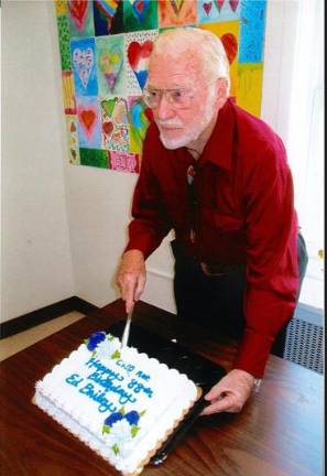 Ed Bailey, photographer and actor, celebrated his 88th birthday at the Greenwood Lake Senior Center. Bailey is historian at the GWL American Legion Post 1443 and a trustee for Warwick Valley VFW Post 4662. A retired photographer for the Associated Press, he still does photography for American Legion, VFW and local newspapers, including <i>The Warwick Advertiser</i>. Photo by Dan Pitiger.