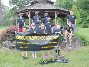 The Chosun Taekwondo Academy Leadership Team at Master Jou’s gazebo in the Warwick Town Park. Pictured from left to right: Bottom row: Luke Cirillo, Kylie Frey, Kamryn Kleveno and Colin Greh. Middle row: Parker Walters, Milo Shaw-Smith Gendelman and Nina Rose Cirillo. Back row: Lucas Greh, Timothy Leonard, Thomas Magee and Maximus Sherman. Not pictured: Gregory Saucedo, Mark Wishnia and Leonardo Blic. Provided photos.