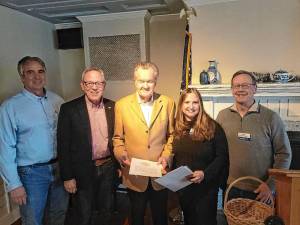 L-R: Rotary District 7210 Governor-elect Leo R. Kaytes, Johndrow, Purcell, Dr. Laurene Iammatteo, chair of club and membership services who conducted the installation, and Warwick Rotary President Neil Sinclair.