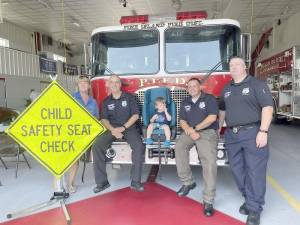 The Warwick Police Department held a successful cat seat safety even on Saturday, July 17, at the Pine Island Fire Department. Certified Car Seat Safety Technicians assisted parents and caregivers with the proper installation of your car seat. Meanwhile, the Pine Island Ambulance Corps also was on hand to check blood pressure and other vitals. Pictured from left to right are: Pine Island EMT Lt. Kelly Pikul, Town of Warwick Police Officer Steve Helmrich, Brooks Meacham, and Town of Warwick Police Officers Steve Pascal and Nathan Petrosky. Photo provided by the Warwick Police Department.