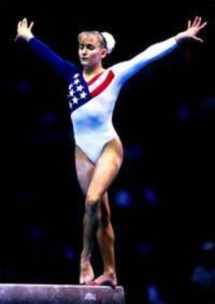 Olympic gymnast coming to Sports, Fitness and Fun for open gym event Shannon Miller during one of her Olympic competitions.