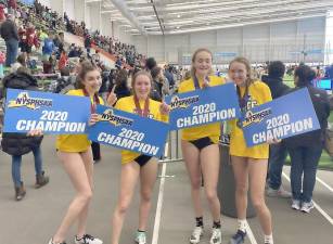 These four runners from Warwick Valley High School are the NYSPHSAA State Champions Girls 4 x 400 Meter Relay. The team - from left to right Julia Mosier, Caroline Fatta, Kristin Thompson and Katherine Smith - finished in 3:51.67, smashing the school record by seven seconds.