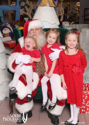 Vote for the best holiday photo Submitted by: Jennifer Devine of Monroe, N.Y. "While visiting Santa, Addyson (21 months) was not concerned with making it on the good list. Her big sisters, Jillian (7) and Brielle (4), knew to keep looking at the camera and smile. They weren't taking a chance on getting on the naughty list!"