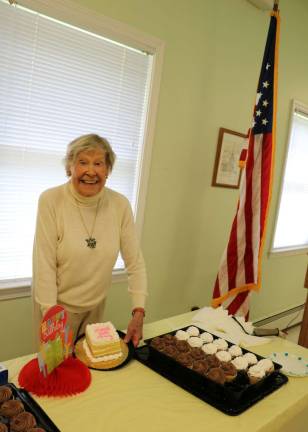 Mary Roukema celebrates 90th birthday at The Warwick Valley Seniors Club Photo by Roger Gavan Mary Roukema is about to serve the cakes for her 90th birthday celebration at The Warwick Valley Seniors Club.