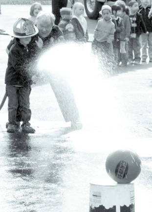 Kids, firefighters and safety Photos by Ed Bailey