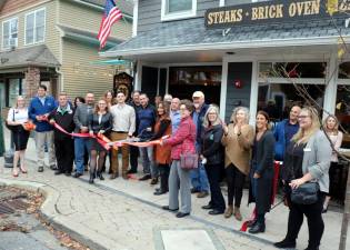 On Wednesday, Oct. 27, Stephanie Badillo (center) celebrated the one-year anniversary of her brand, “Your Hudson Valley Life,” with a ribbon cutting ceremony hosted by the Orange County Chamber of Commerce at the new Barrel 28 Restaurant in the Village of Florida. Photo by Roger Gavan.
