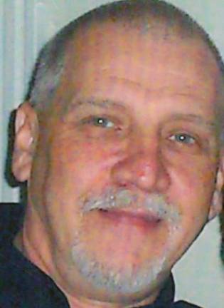 George M. Delade George M. Delade