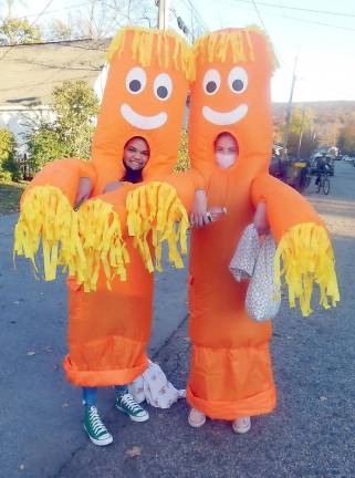 Greenwood Lake. Ghosts, goblins and orange tube dancers Orange tube dancers Hillary Surun and Alexa Hanna.