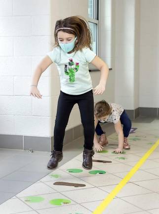 One of the student activities along the sensory pathways include jumping from one numbered banana to the next on a banana tree.