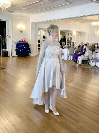 Lynne Arnold looking elegant during the evening gown portion of the program. The judges were looking for poise, elegance, grace, and level of comfort before an audience.